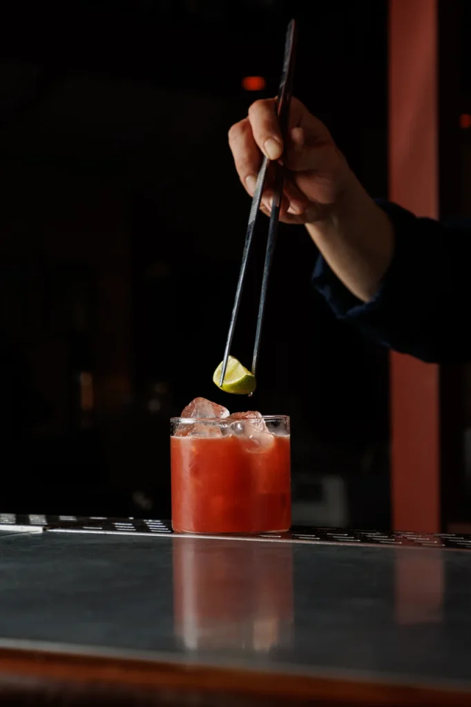 Khubani White Negroni served at Tanvi, an Indian restaurant and cocktail lounge in St George’s Bay Malta, featuring mezcal, sake and spiced apricot.
