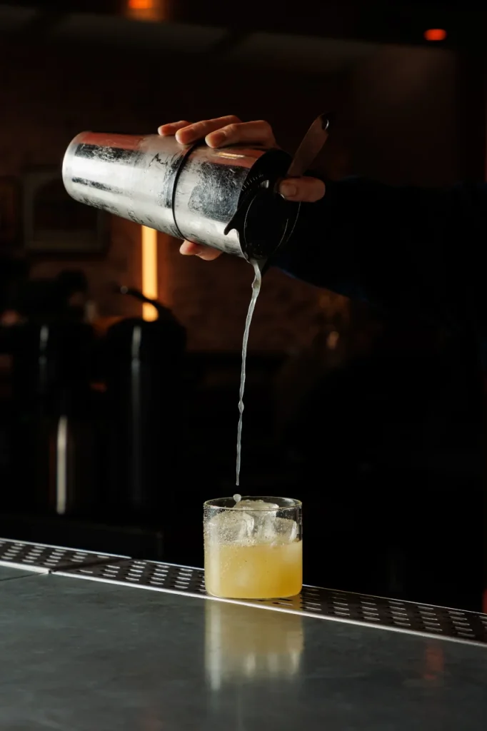 Narikela coconut cocktail served at Tanvi, an Indian restaurant and cocktail lounge in St George’s Bay Malta, featuring pisco, chilli tincture and vanilla foam