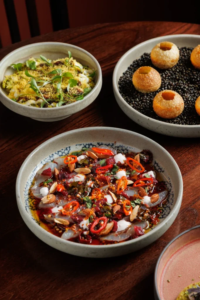 Cured sea bream, aloo gobi gnocchi and pani puri served at Tanvi, an Indian restaurant in St George’s Bay Malta